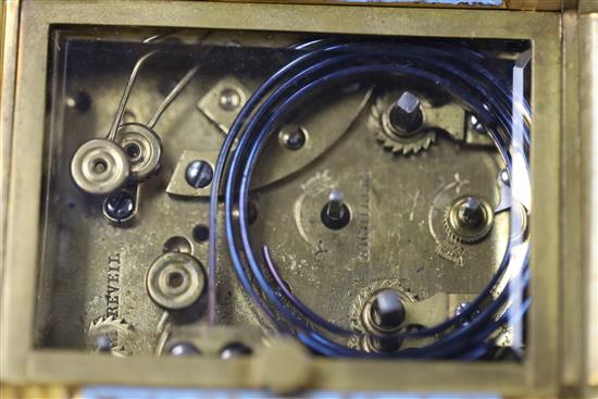 An early 20th century French ormolu and champleve enamel repeating carriage clock with alarm, 4.5in.